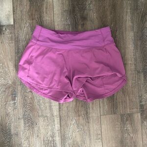 PINK LULULEMON SPEED UP SHORTS - 4 inch size 4